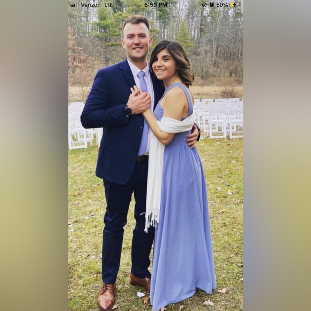 Dusty blue floor length dress.